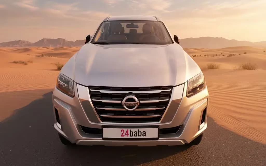Nissan X Terra 2023 Silver front view with headlights – rental in Dubai