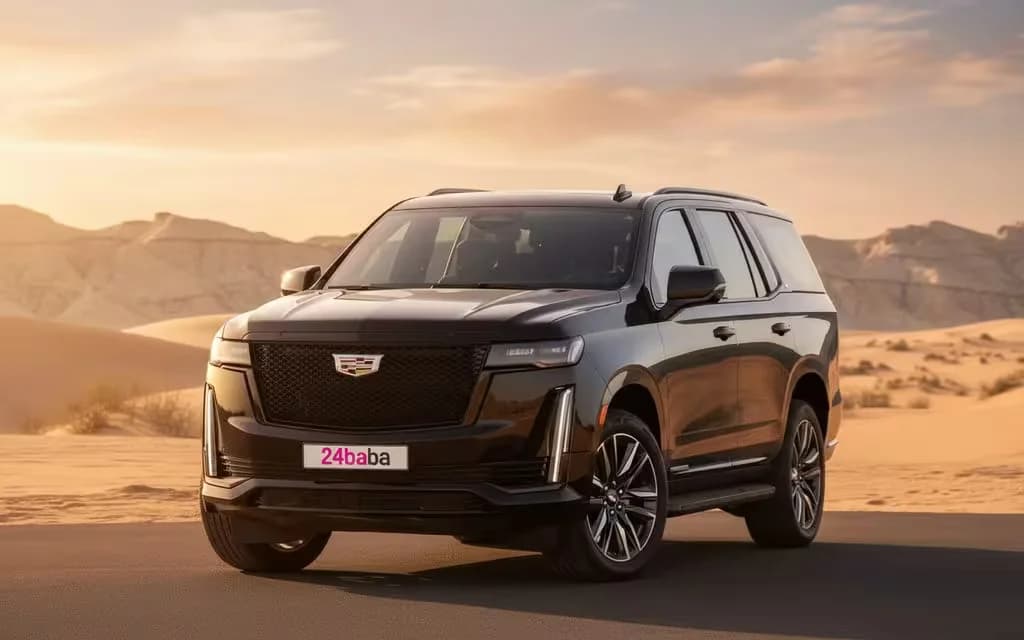 Cadillac Escalade 2022 Black front view with headlights – rental in Dubai