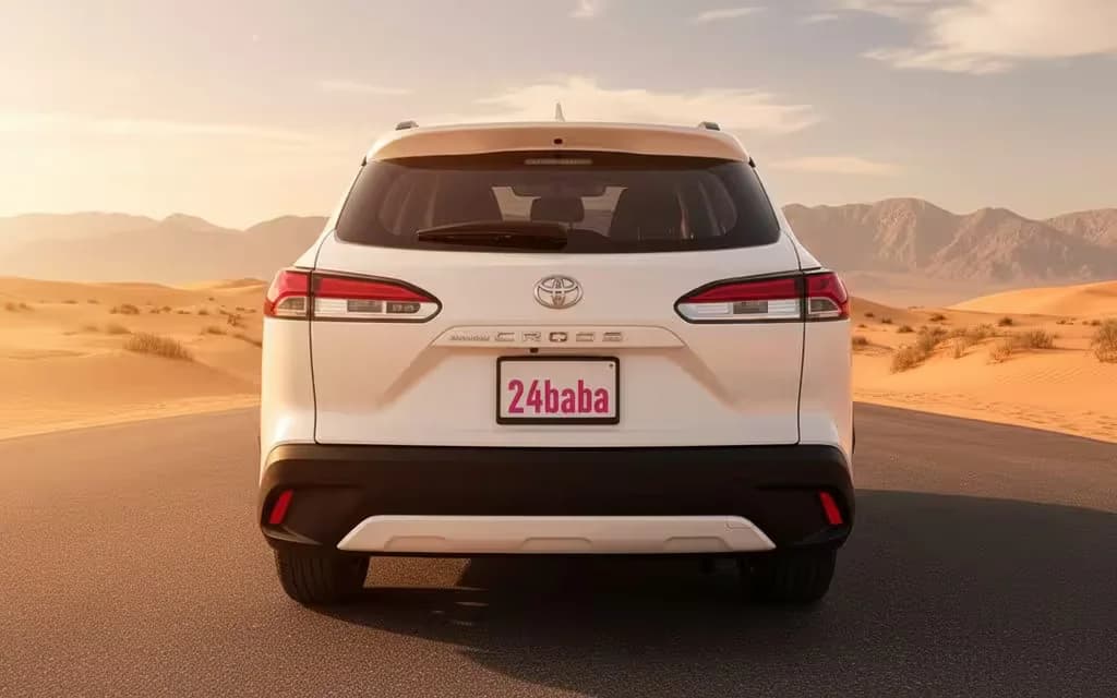 Toyota CorollaCross 2024 White rear view showing taillights – rental in Dubai