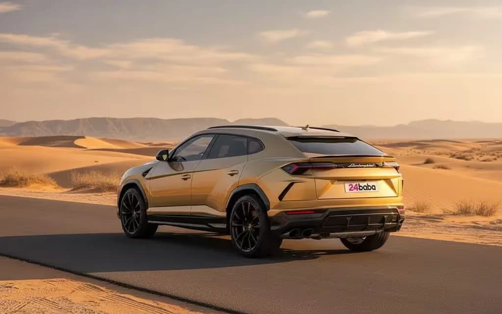 Lamborghini Urus 2022 Gold parked outdoor scene – rental in Dubai