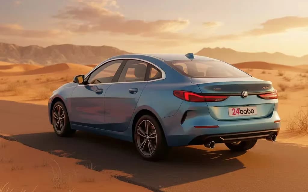 Bmw 228 2021 Blue rear view showing taillights – rental in Dubai