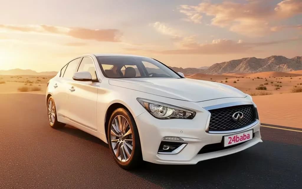 Infiniti Q50 2023 White front view with headlights – rental in Dubai