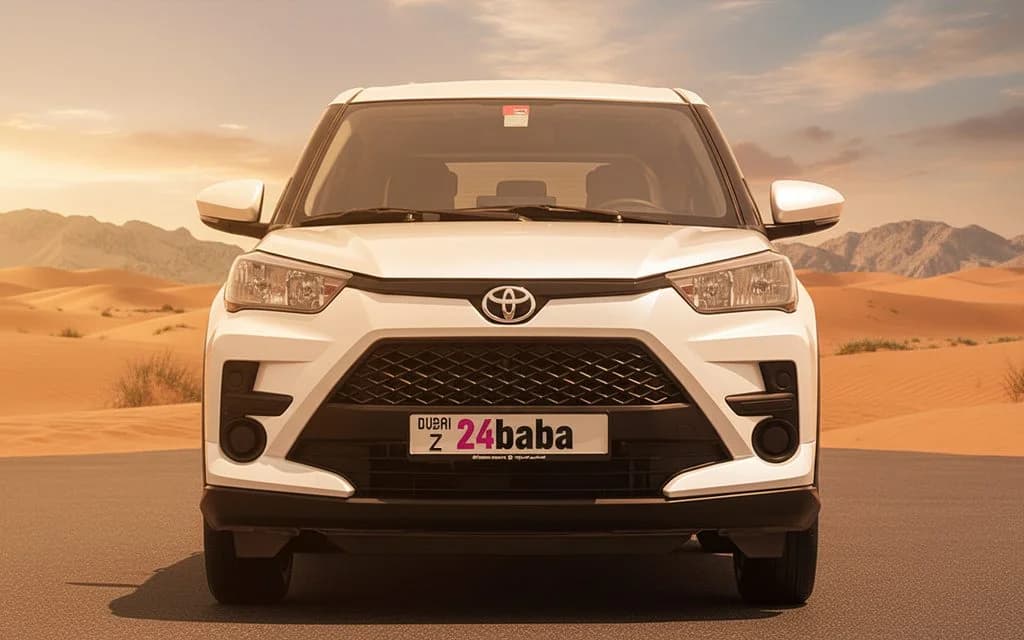 Toyota Raize 2023 White front view with headlights – rental in Dubai
