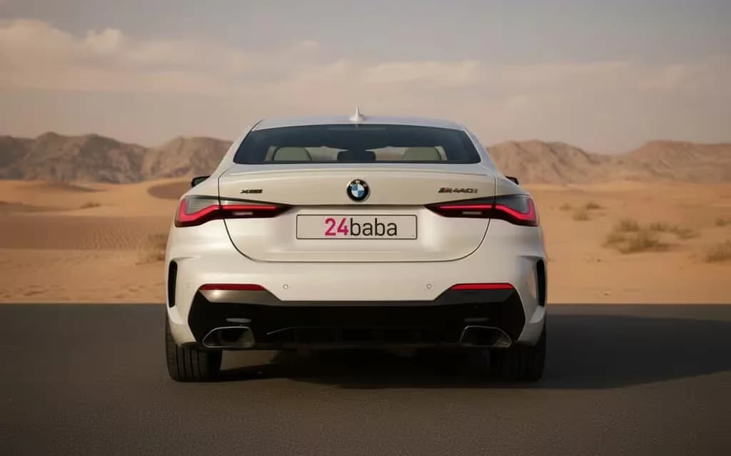 Bmw 440 2021 White rear view showing taillights – rental in Dubai