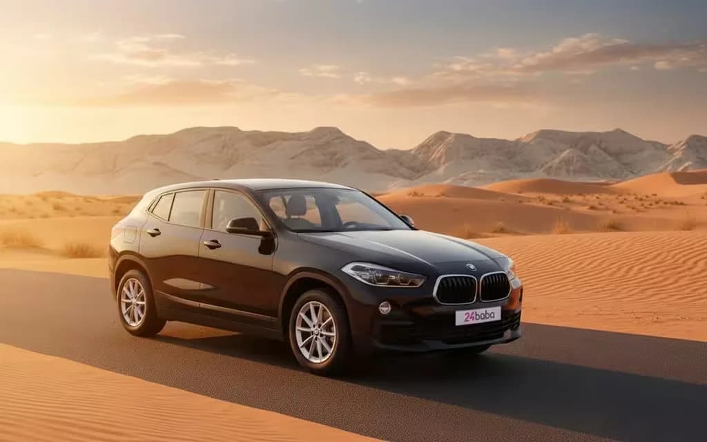 Bmw X2 2023 Black front view with headlights – rental in Dubai