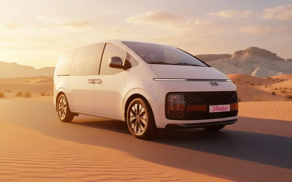 Front angle of white 2024 Hyundai Staria van showing headlights