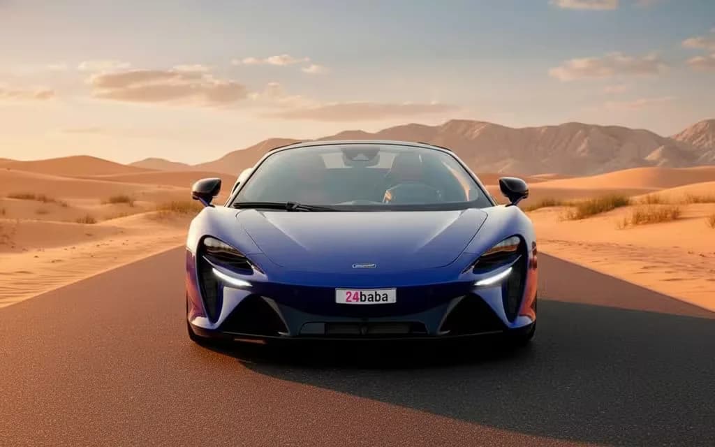 Mclaren Artura 2025 Blue front view with headlights – rental in Dubai