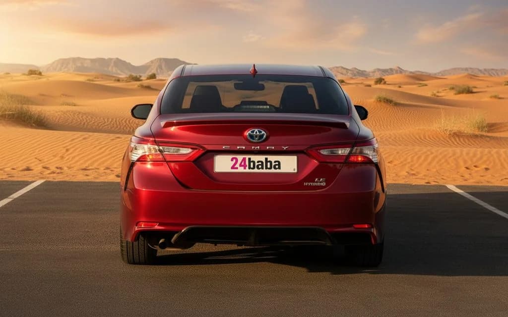 Toyota Camry 2020 Red rear view showing taillights – rental in Dubai