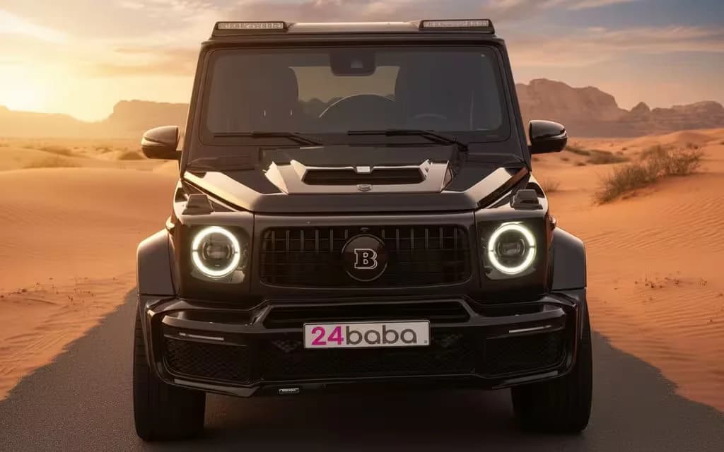 Mercedes G63 2023 Black front view with headlights – rental in Dubai