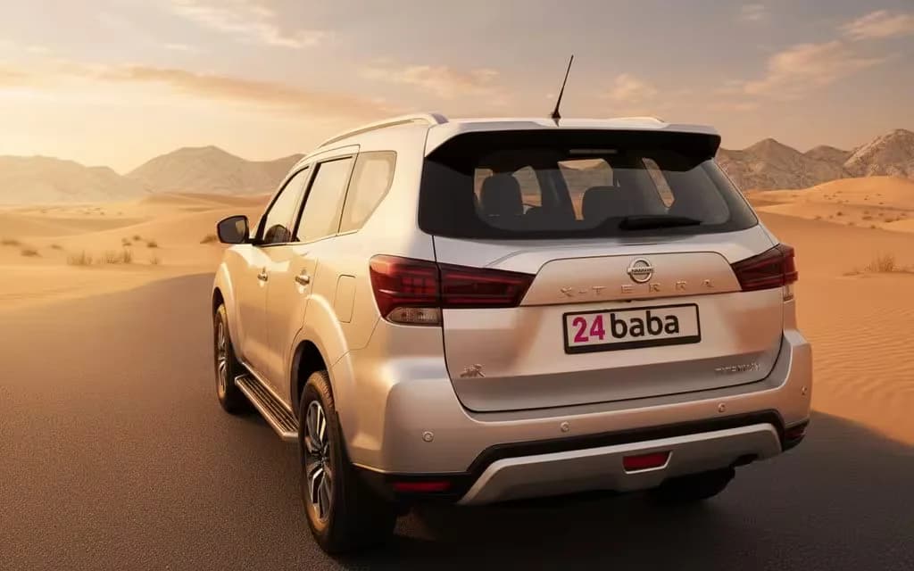 Nissan X Terra 2023 Silver rear view showing taillights – rental in Dubai