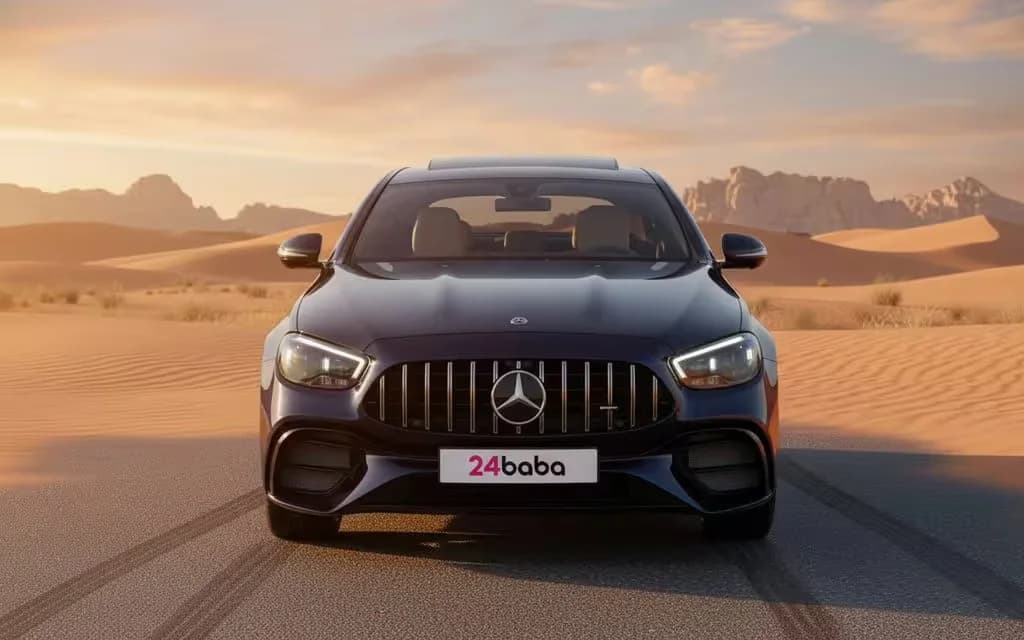 Mercedes E300 2025 Blue front view with headlights – rental in Dubai