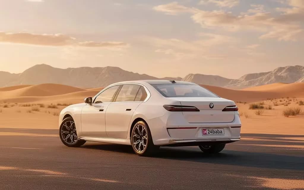 Bmw 735 2023 white rear view showing taillights – rental in Dubai
