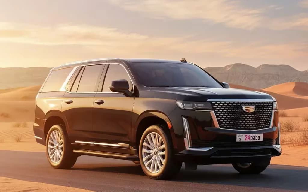Cadillac Escalade 2022 Black front view with headlights – rental in Dubai