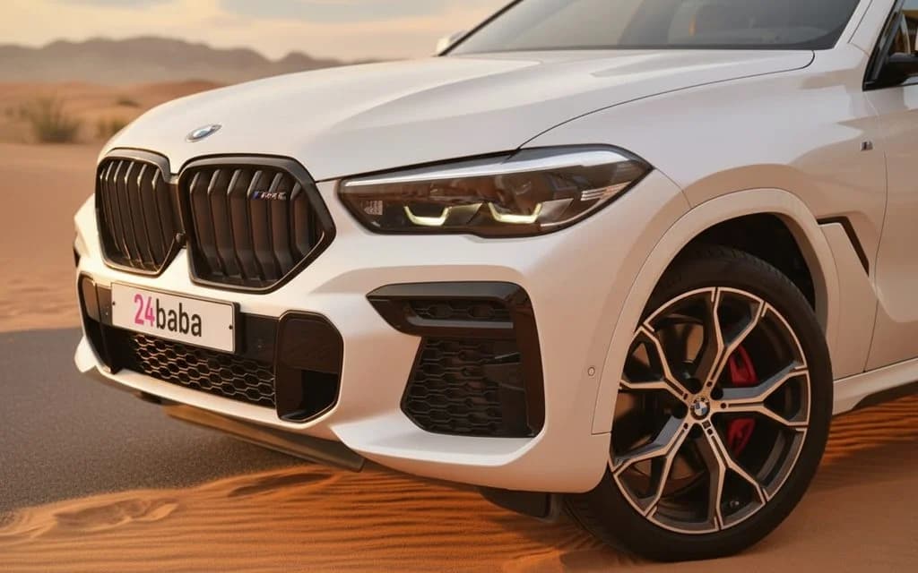 Bmw X6 2024 White front view with headlights – rental in Dubai