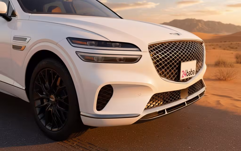 Genesis Gv70 2023 White front view with headlights – rental in Dubai