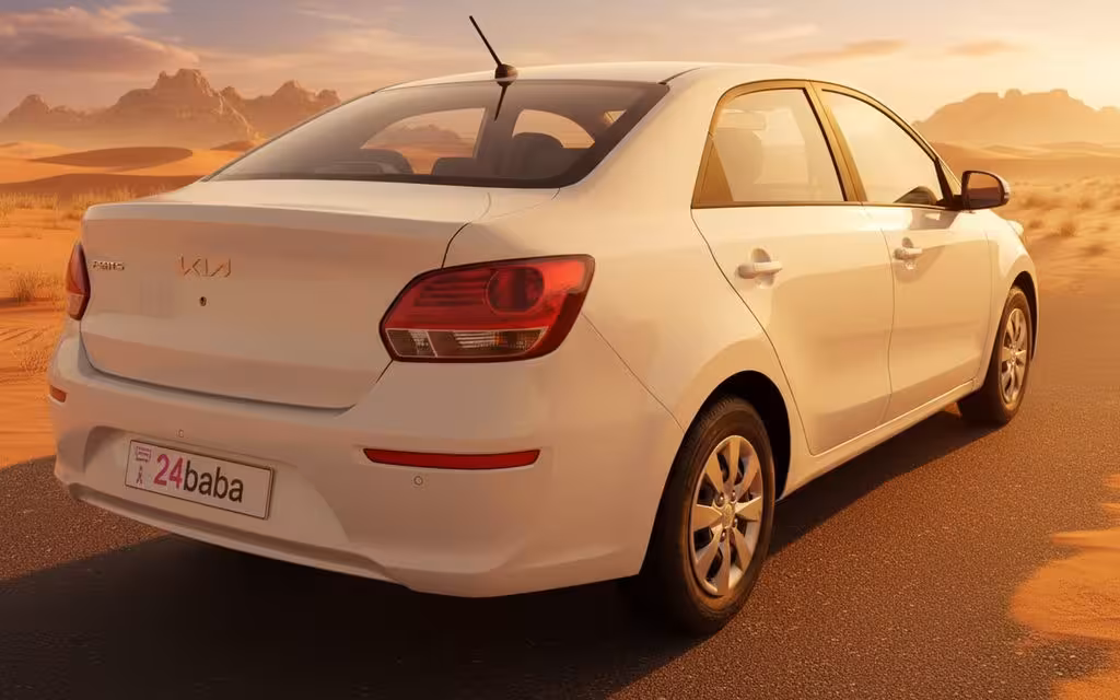 Kia Pegas 2022 White rear view showing taillights – rental in Dubai