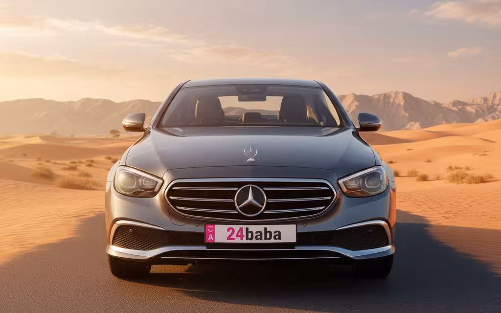 Mercedes E200 2022 Grey front view with headlights – rental in Dubai