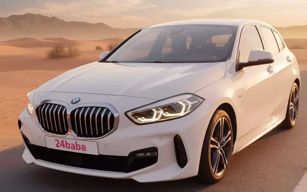 Bmw 120 2021 White cover image – rental in Dubai