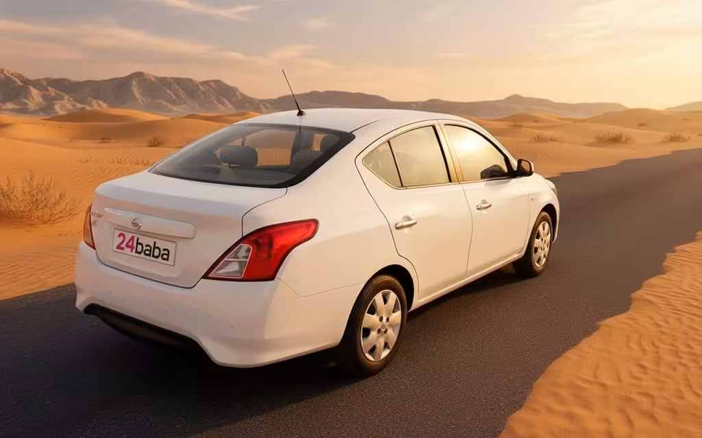 Nissan Sunny 2023 White rear view showing taillights – rental in Dubai