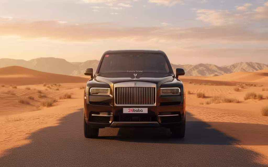 RollsRoyce Cullinan 2023 Black front view with headlights – rental in Dubai