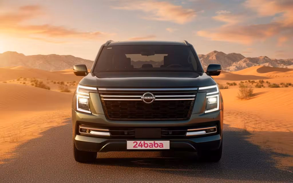 Nissan Patrol 2025 Green front view with headlights – rental in Dubai Nissan Patrol 2025 Green front view with headlights – rental in Dubai