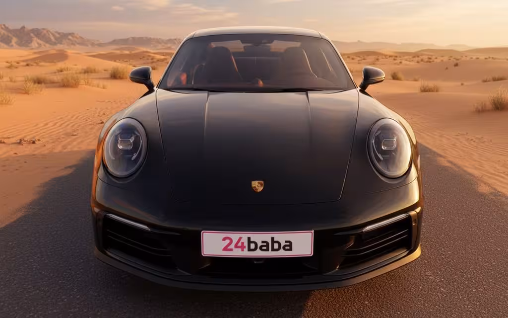 Porsche 911 2025 Black front view with headlights – rental in Dubai