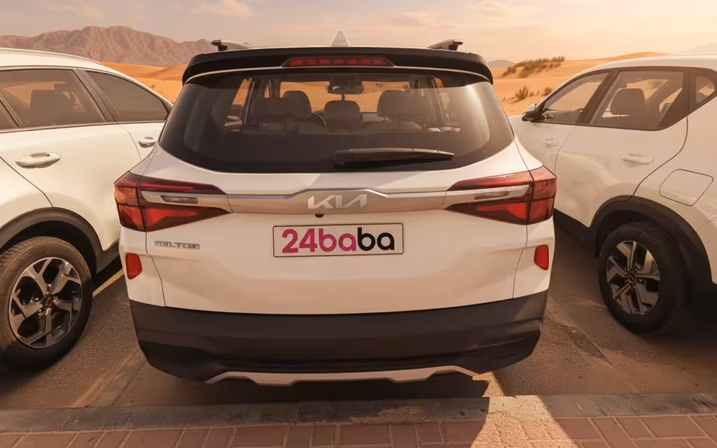 Kia Seltos 2025 White rear view showing taillights – rental in Dubai
