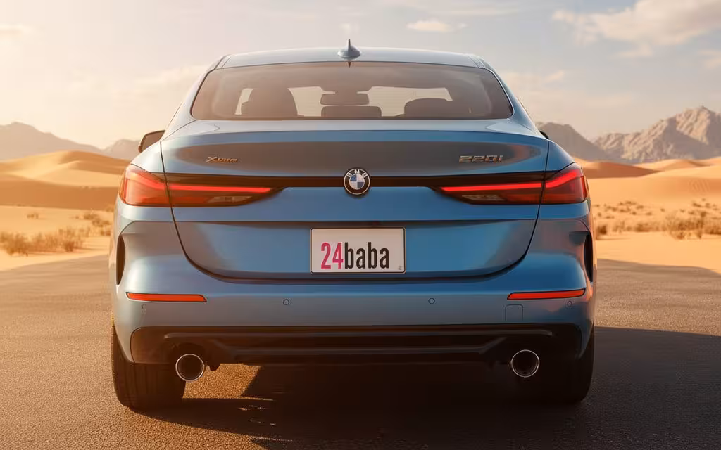 Bmw 228 2021 Blue rear view showing taillights – rental in Dubai