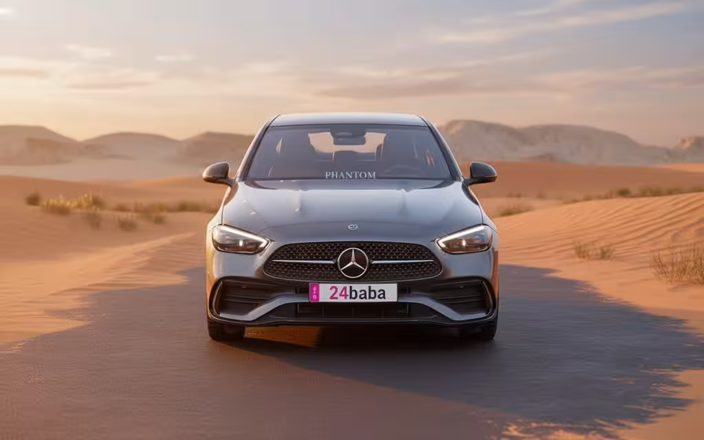 Mercedes C200 2024 Grey front view with headlights – rental in Dubai