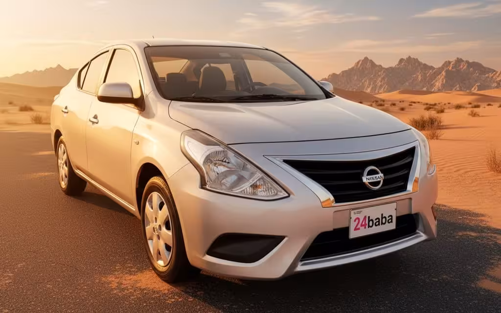 Nissan Sunny 2024 Silver front view with headlights – rental in Dubai