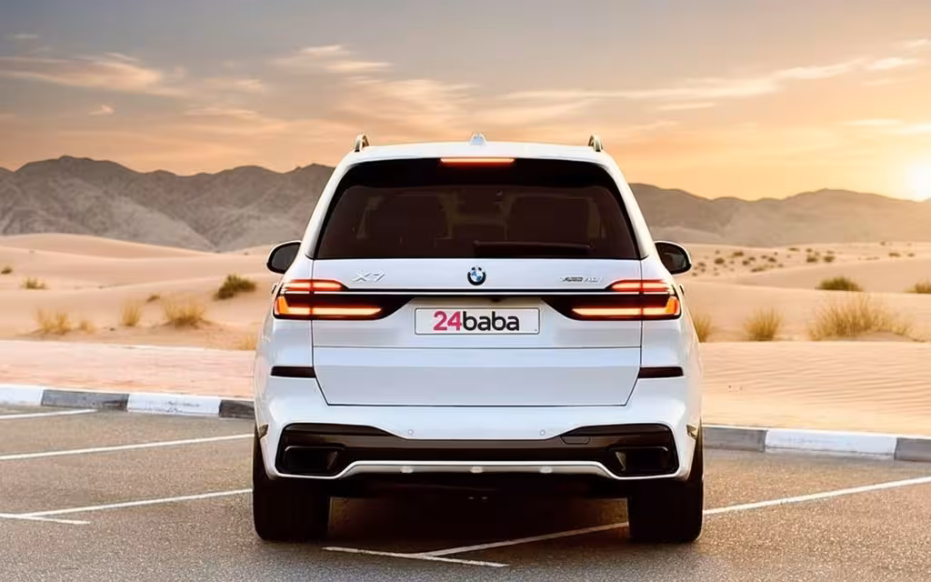 Bmw X7 2024 White rear view showing taillights – rental in Dubai
