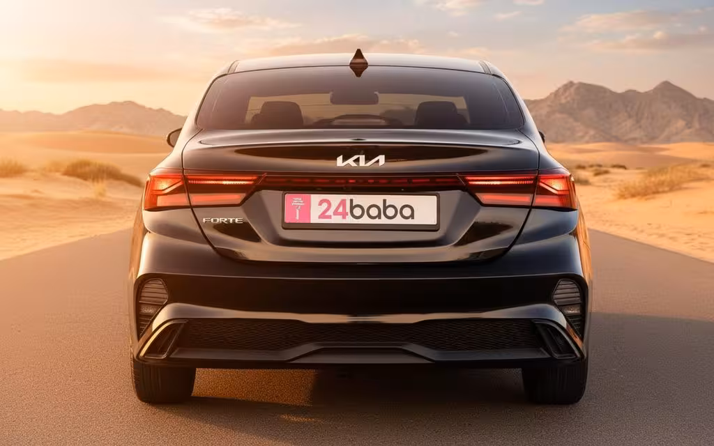 Kia Forte 2024 Black rear view showing taillights – rental in Dubai