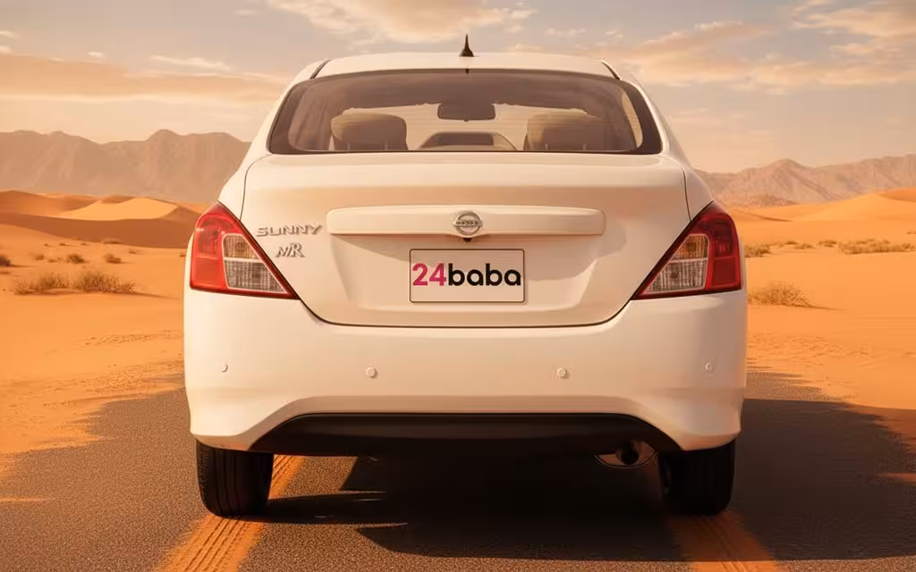 Nissan Sunny 2023 White rear view showing taillights – rental in Dubai