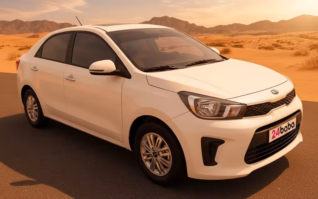 Kia Pegas 2025 White front view with headlights – rental in Dubai