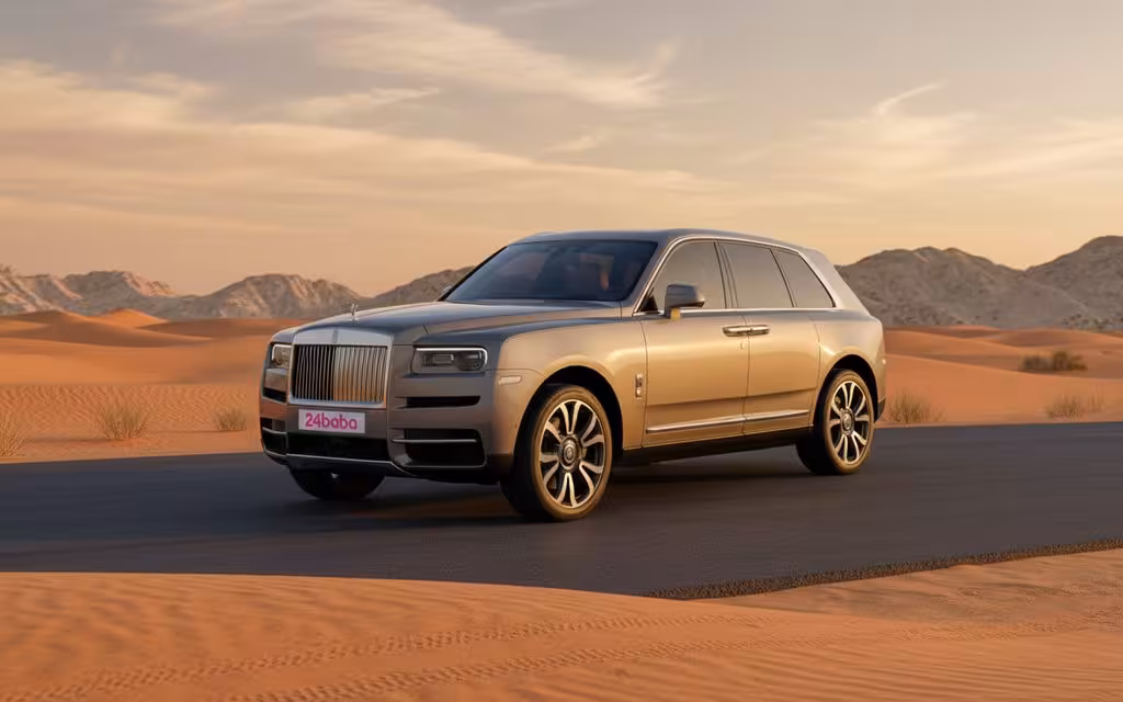 RollsRoyce Cullinan 2021 Silver front view with headlights – rental in Dubai