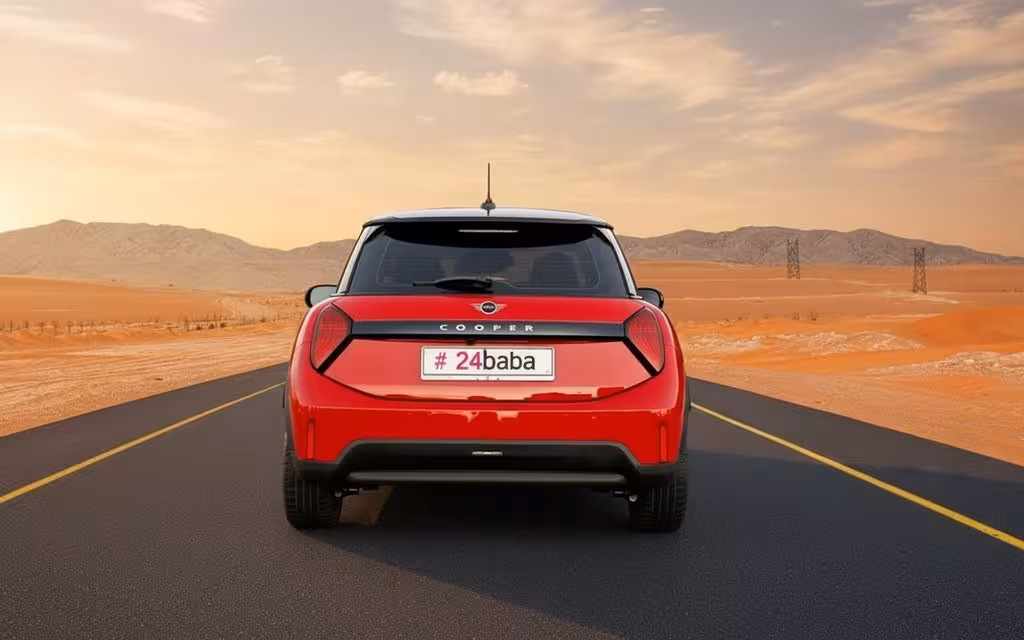 Mini Cooper 2025 Red rear view showing taillights – rental in Dubai Mini Cooper 2025 Red rear view showing taillights – rental in Dubai