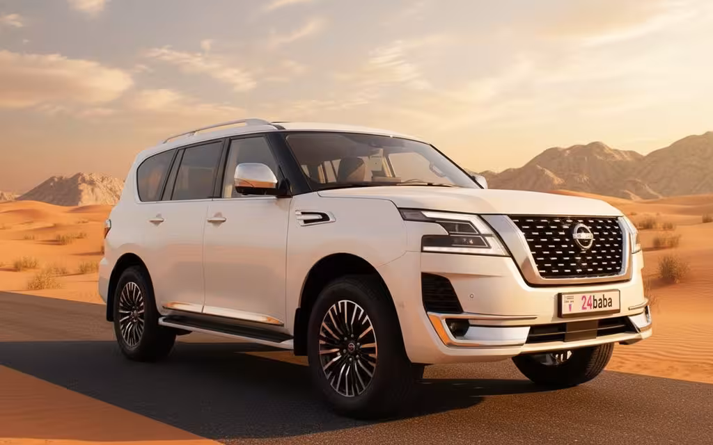 Nissan Patrol 2022 White front view with headlights – rental in Dubai Nissan Patrol 2022 White front view with headlights – rental in Dubai