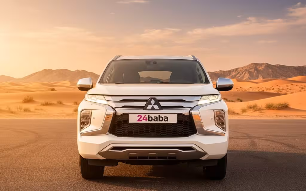 Mitsubishi Montero 2023 White front view with headlights – rental in Dubai