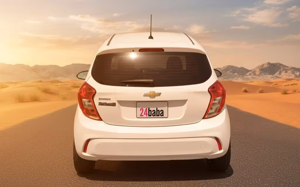 Chevrolet Spark 2020 White rear view showing taillights – rental in Dubai