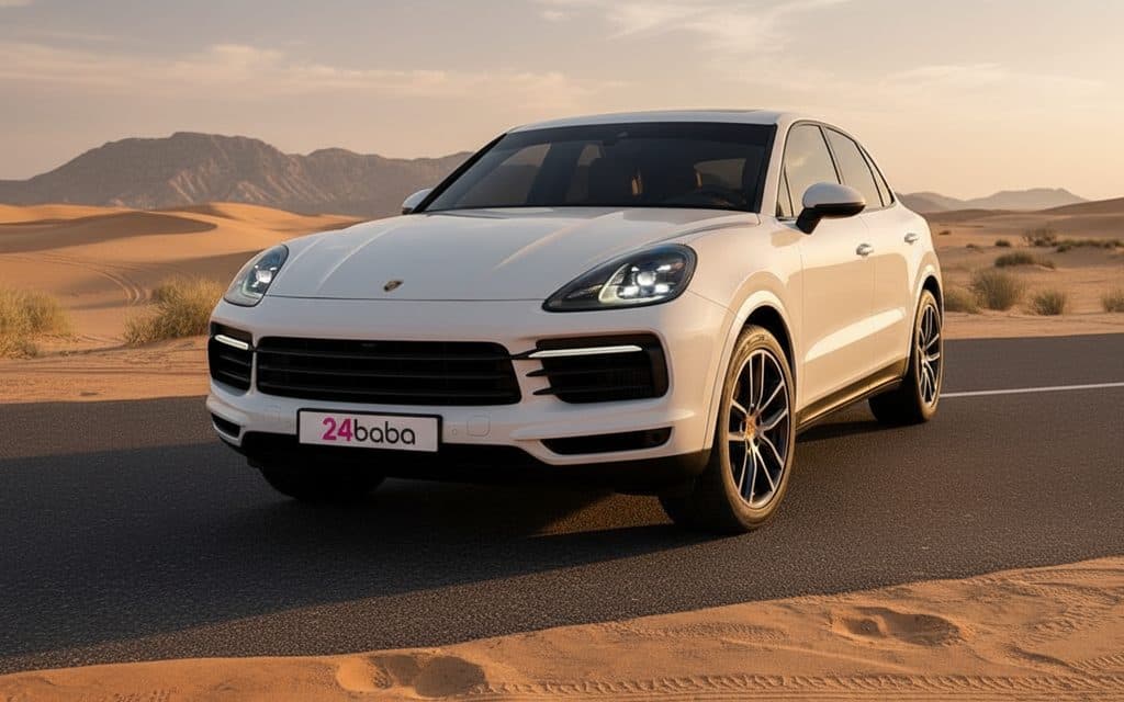 Porsche Cayenne 2023 White front view with headlights – rental in Dubai