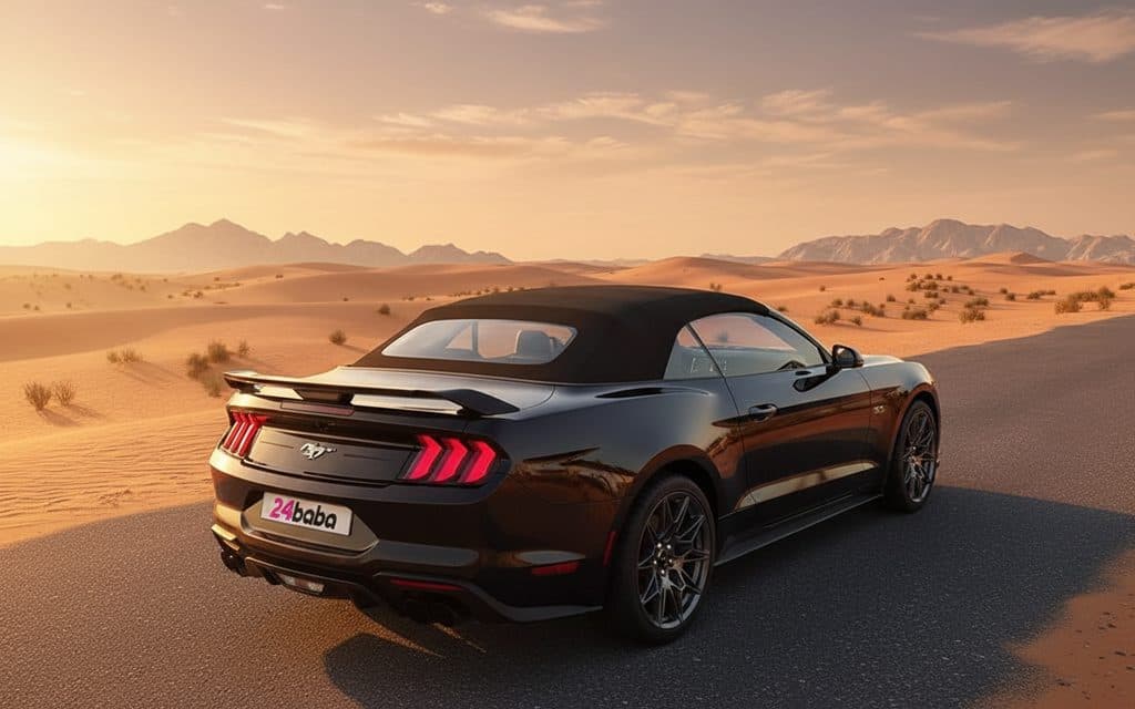 Ford Mustang 2024 Black rear view showing taillights – rental in Dubai