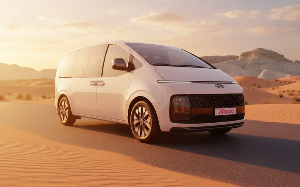 Front angle of white 2024 Hyundai Staria van showing headlights