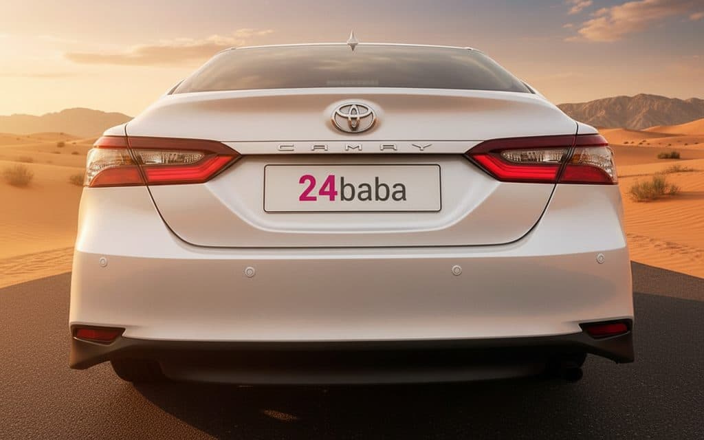 Toyota Camry 2023 White rear view showing taillights – rental in Dubai