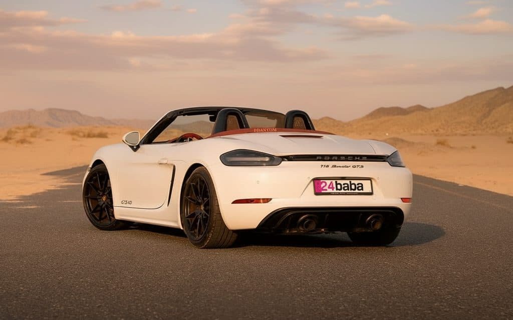 Porsche Boxster 2021 White rear view showing taillights – rental in Dubai