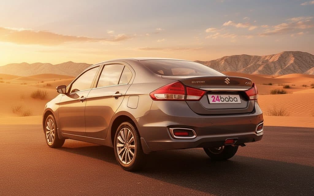 Suzuki Ciaz 2024 Silver rear view showing taillights – rental in Dubai