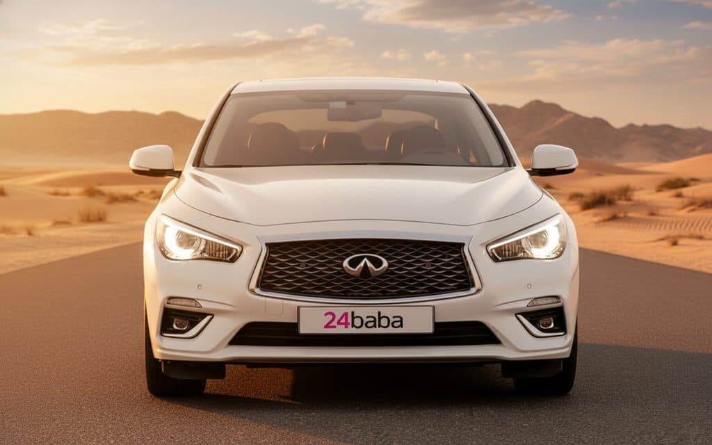 Infiniti Q50 2023 White front view with headlights – rental in Dubai