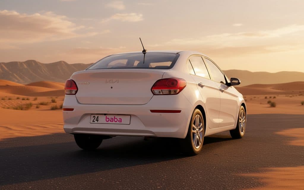 Kia Pegas 2024 White rear view showing taillights – rental in Dubai