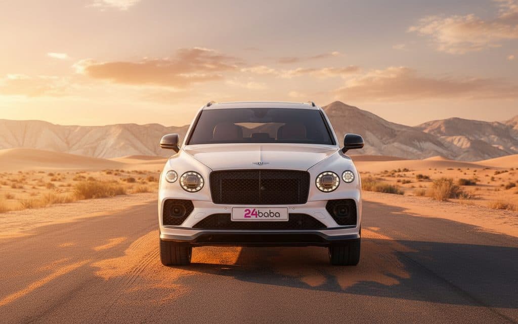 Bentley Bentayga 2023 White front view with headlights – rental in Dubai