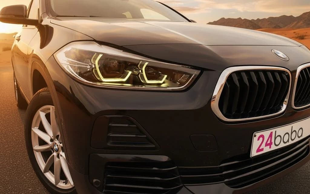 Bmw X2 2023 Black front view with headlights – rental in Dubai
