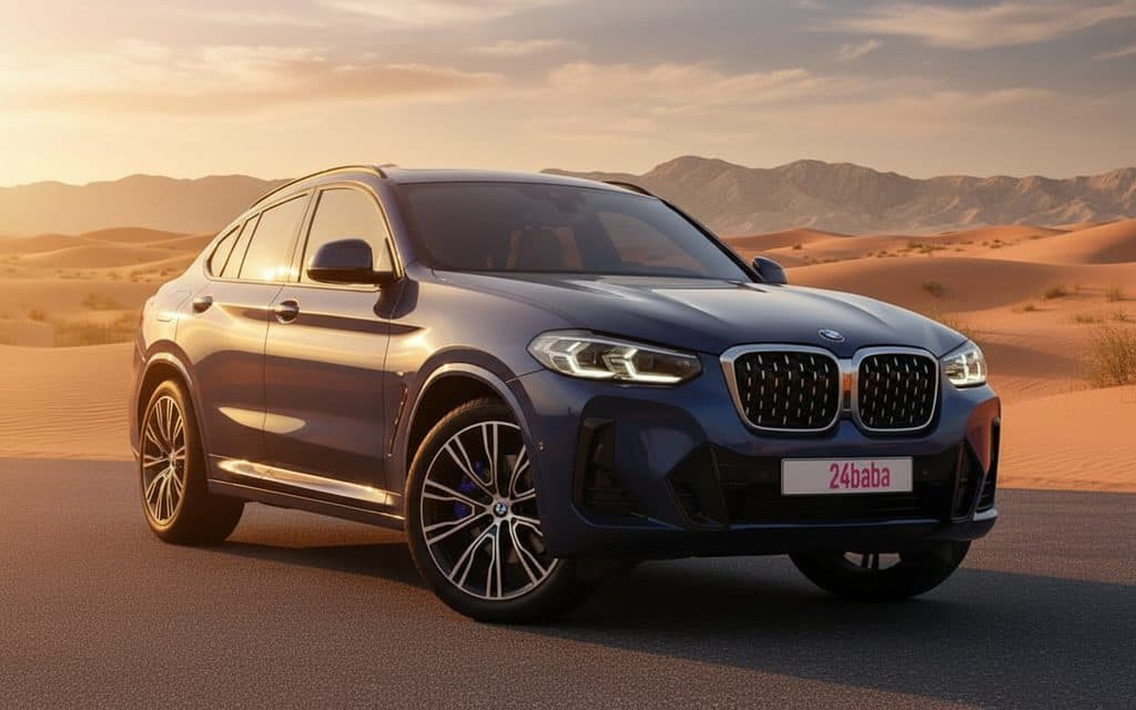 Bmw X4 2023 Blue front view with headlights – rental in Dubai